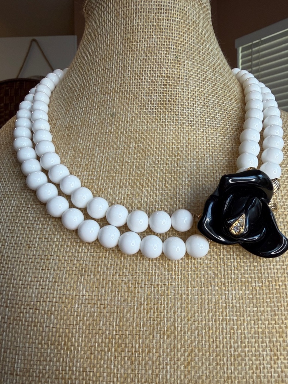Kenneth Jay Lane White Beaded Necklace with Black Floral Accent Clasp